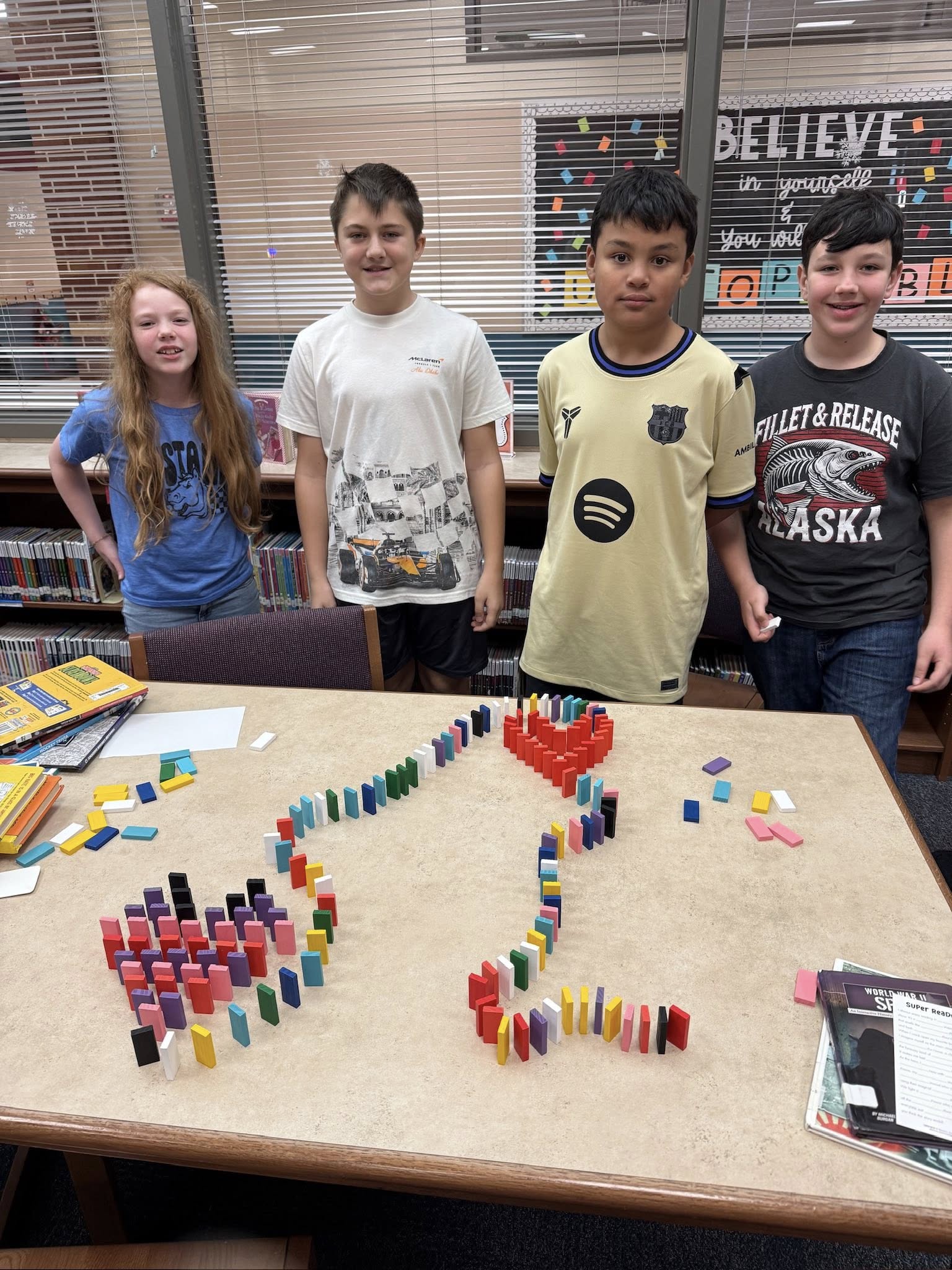 Students participating in hands on activities in the library