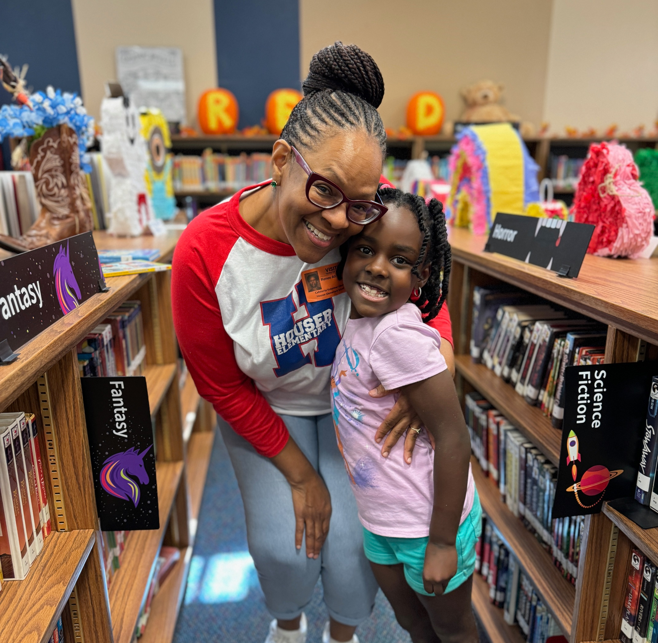 Girl and grandma in the library