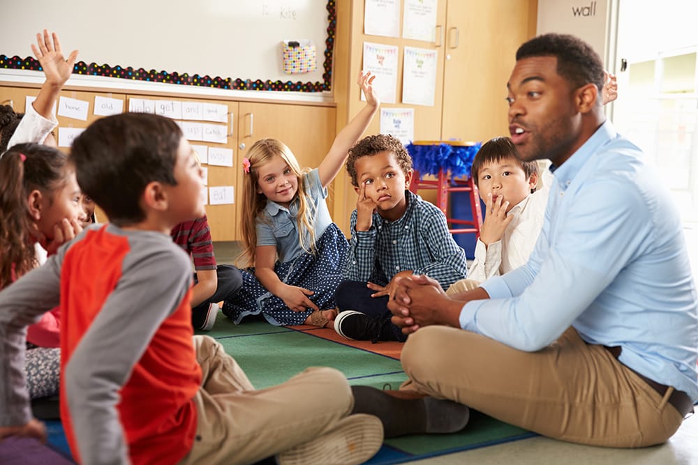 Teacher with students