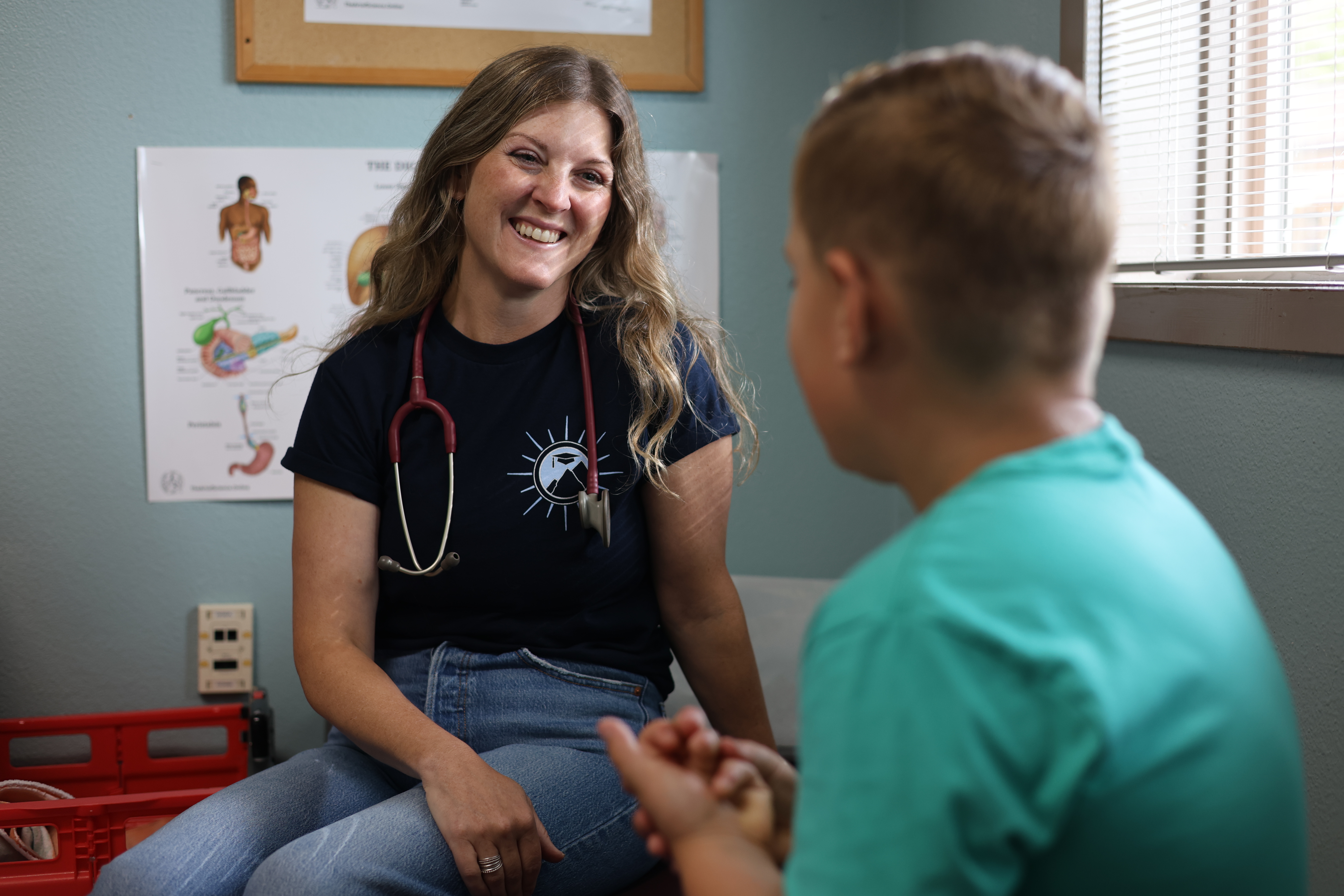 Nurse speaking with a student