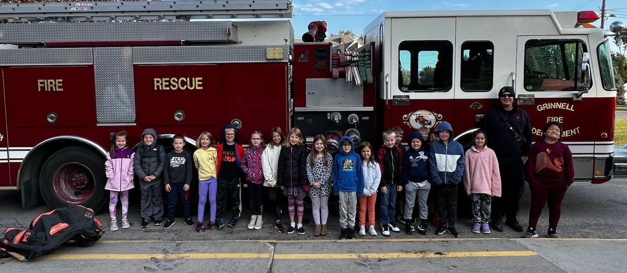 Firetruck and students at Bailey Park