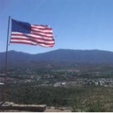 Flag flying high in the air.