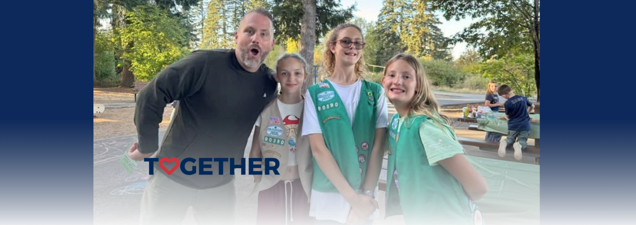Mr. O with HHES students in Girl Scout Troop 90390.
