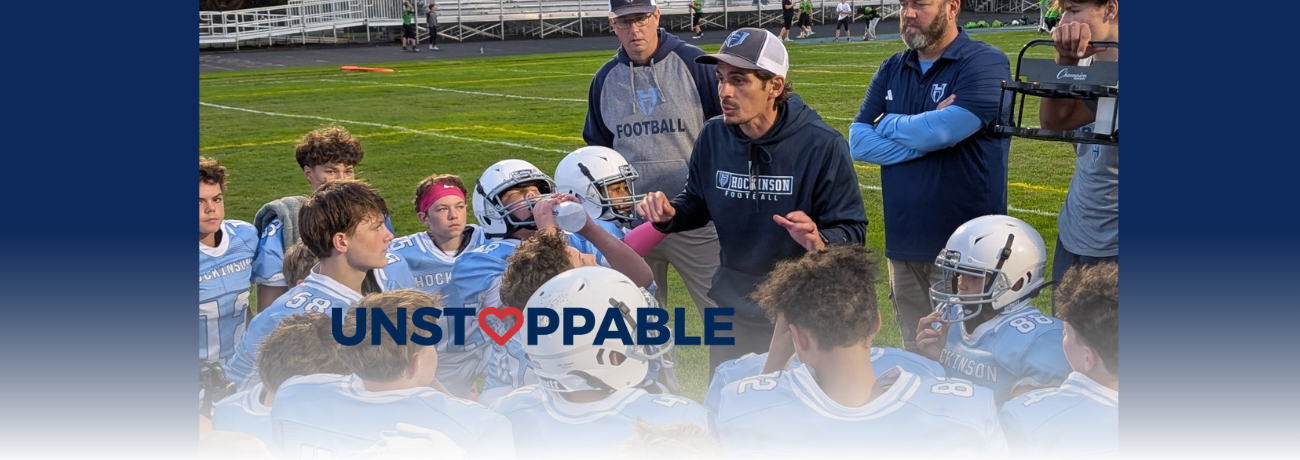 HMS Football Head Coach Sid Slom addresses players at halftime during their October 1, 2025 home game.