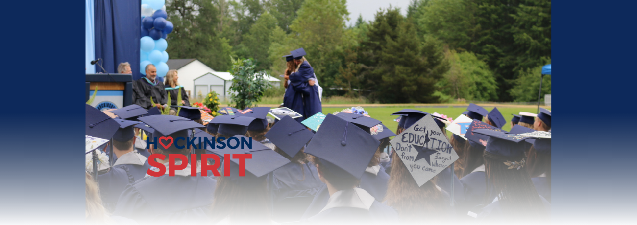 Hockinson High School Class of 2023 wearing their caps and gowns at their graduation ceremony.