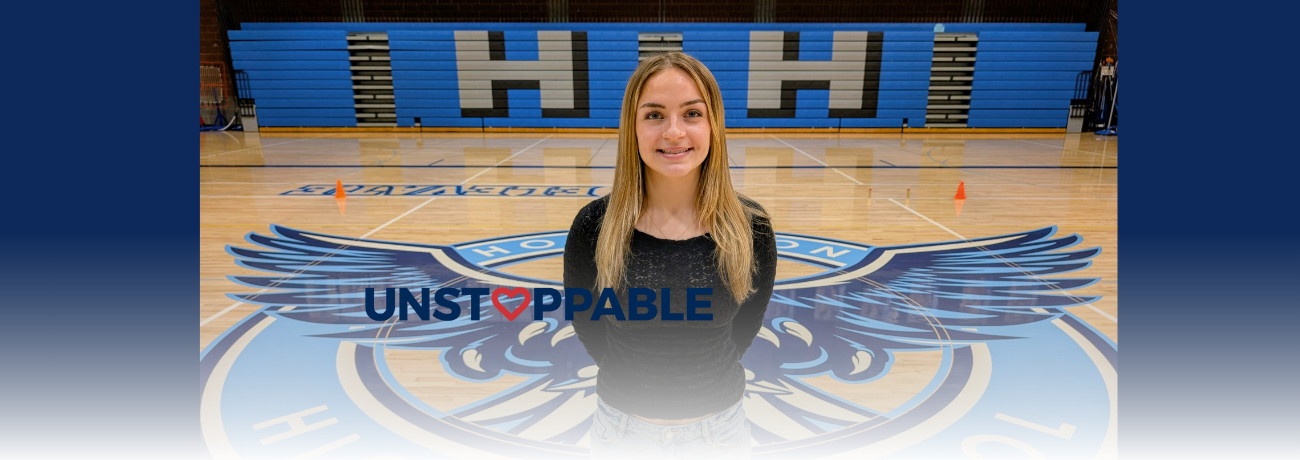 HHS senior and wrestler Teagan stands in the HHS Gym.