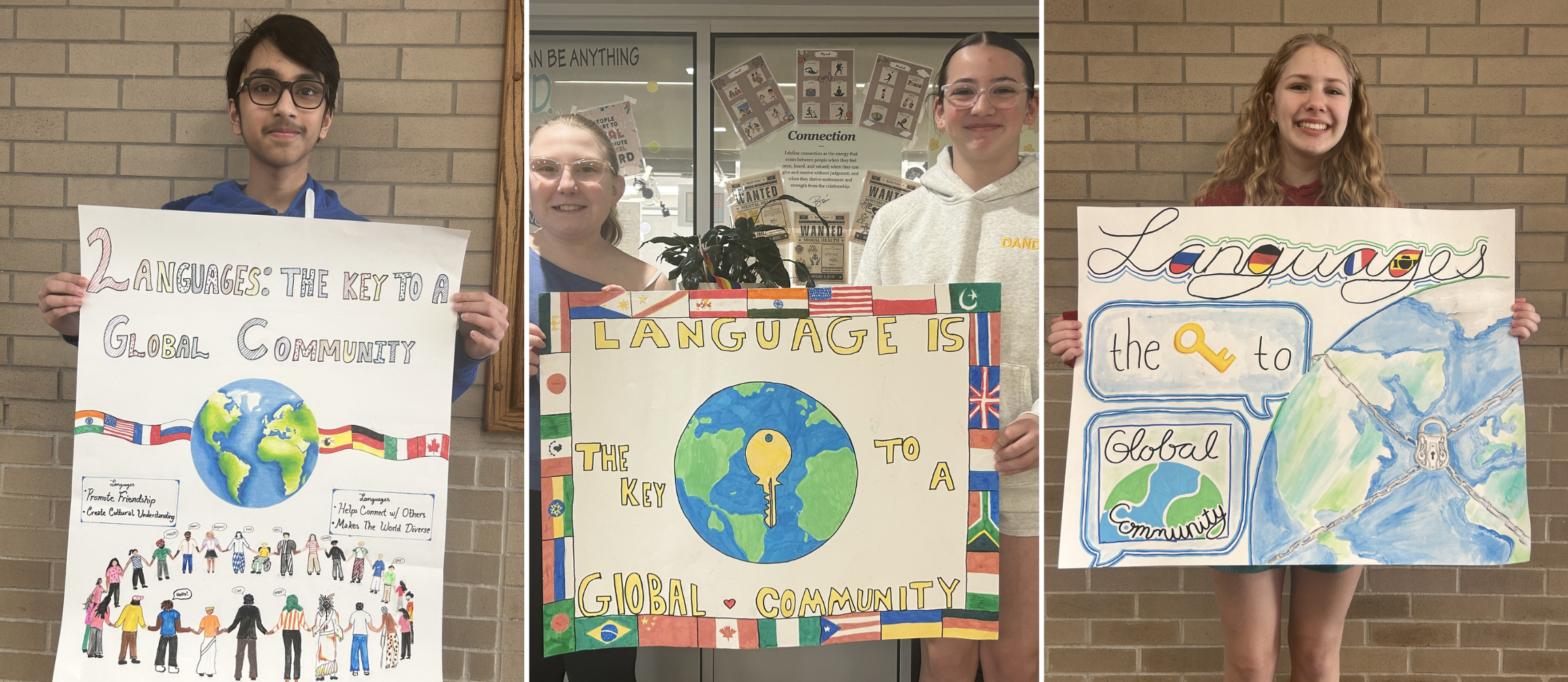 Shaker middle school students holding up posters to celebrate world language month