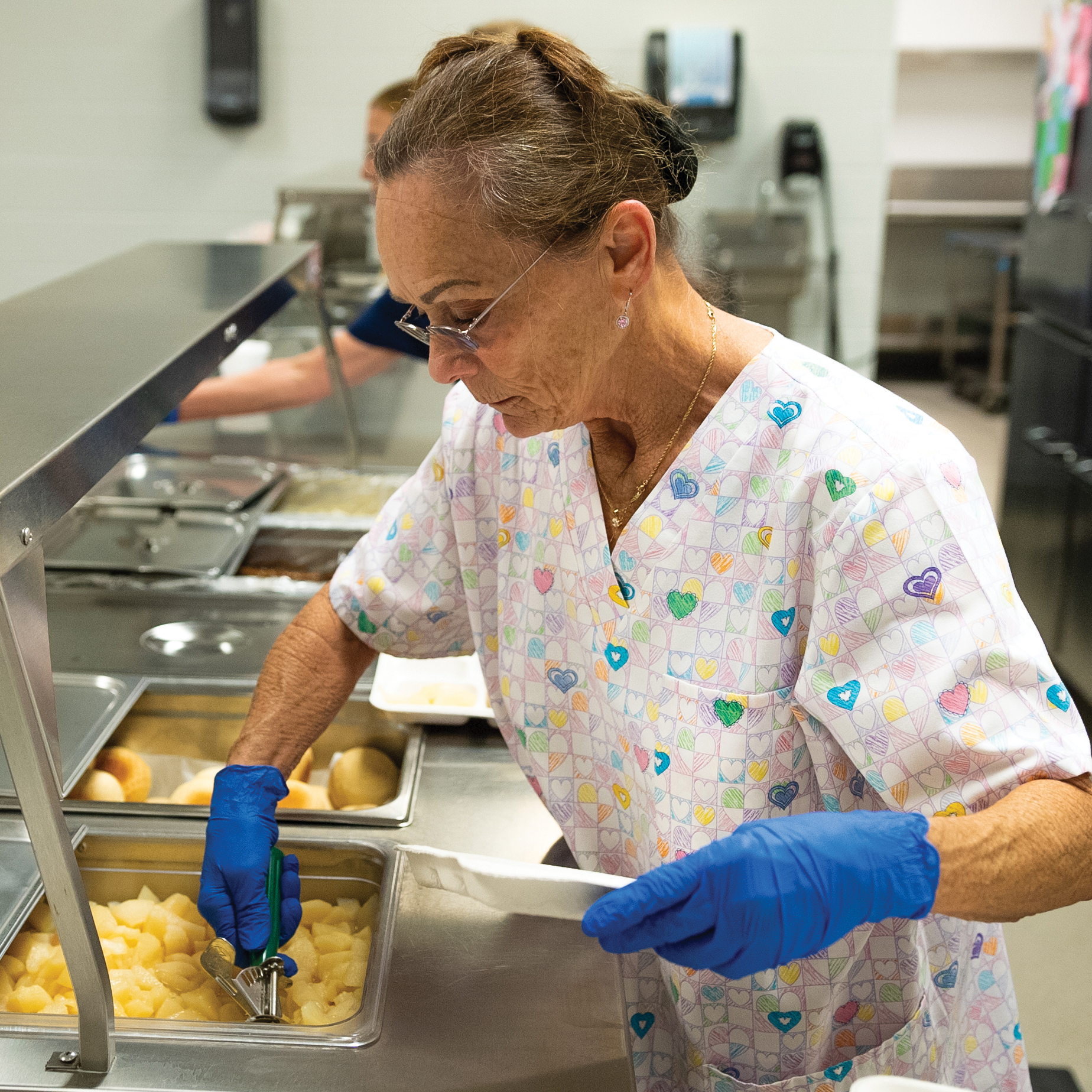 Cook serving potatoes