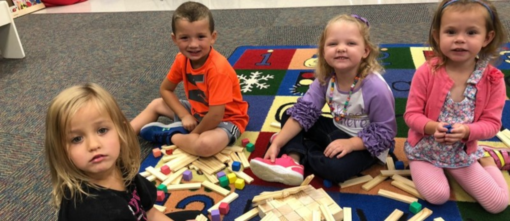 photo of students playing with blocks