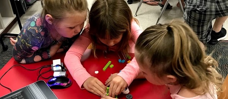 photo of students playing with legos