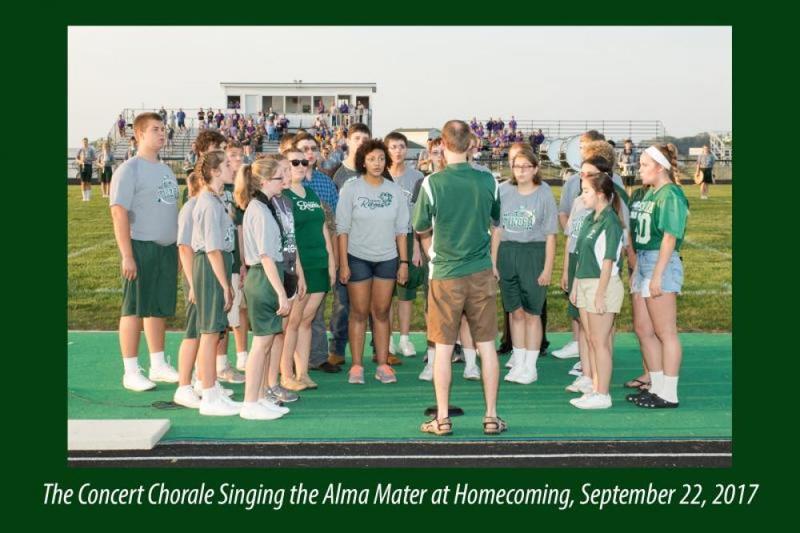 The concert chorale singing the Alma Mater at Homecoming, September 22, 2017