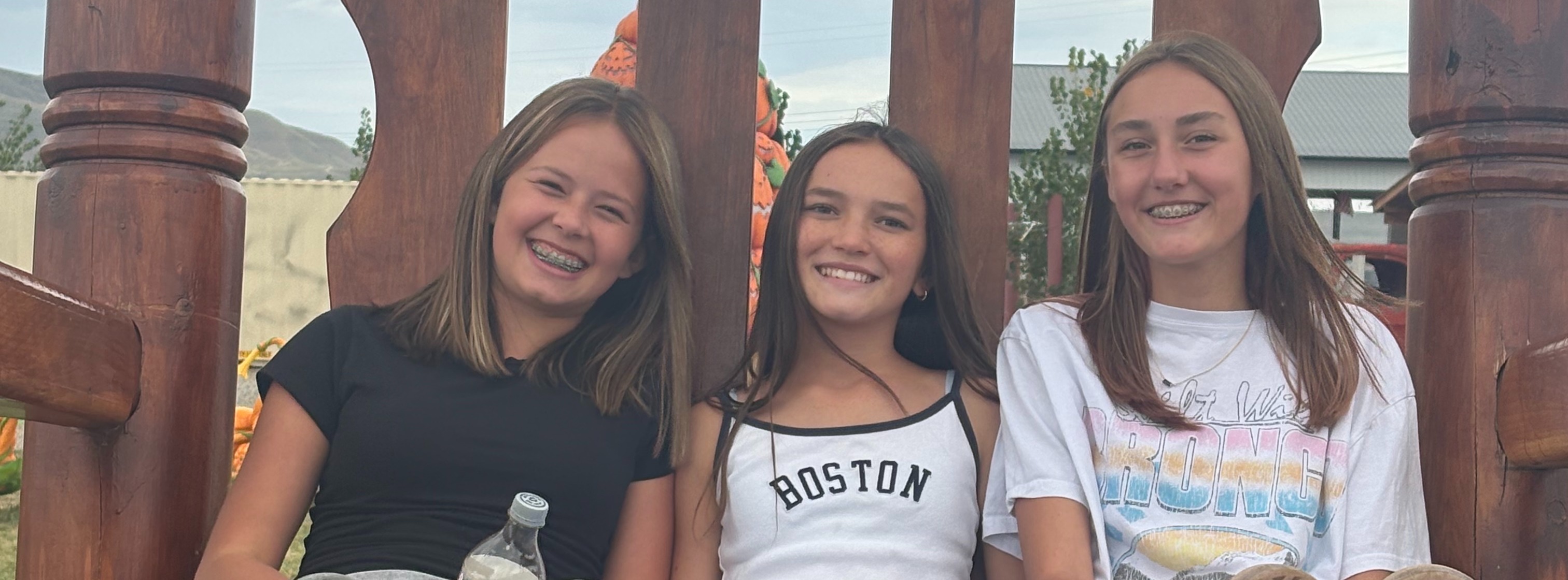 girls sitting in chair