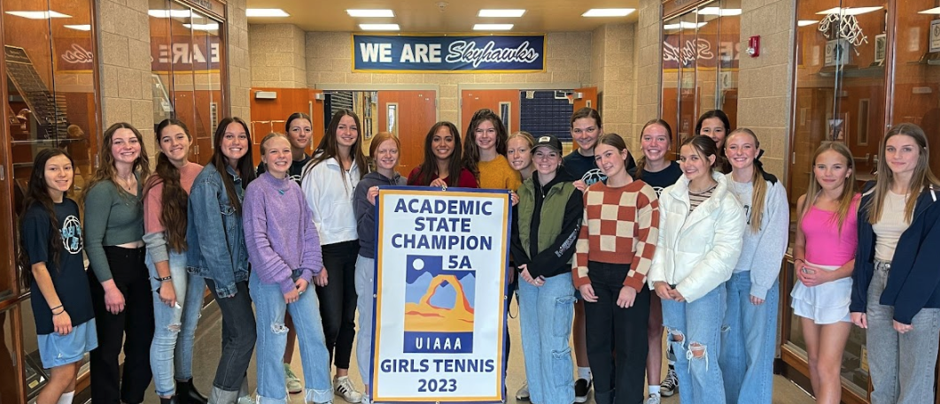 tennis team posing for a picture