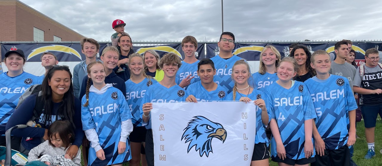 soccer team with a sign