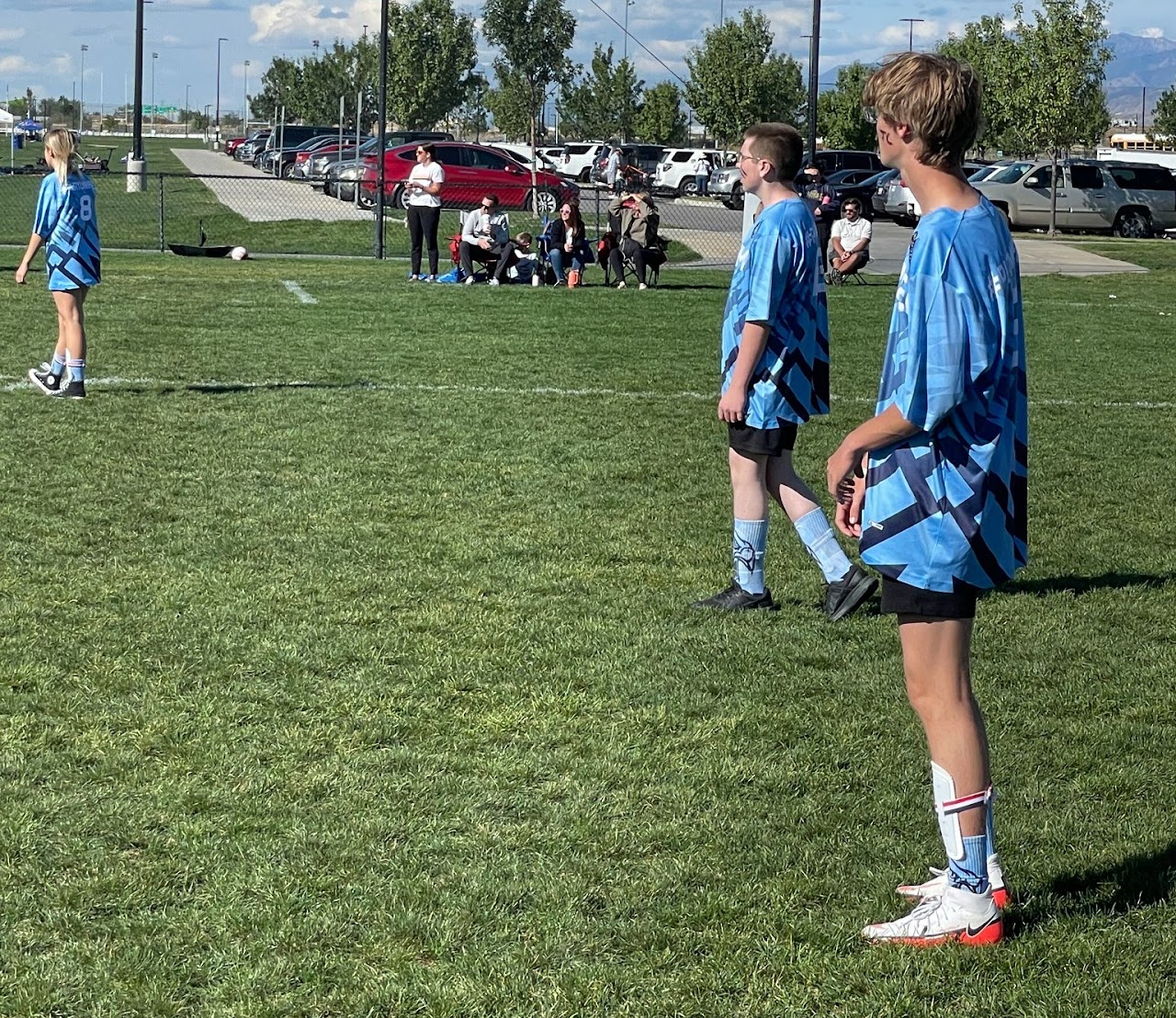 soccer team walking on the field