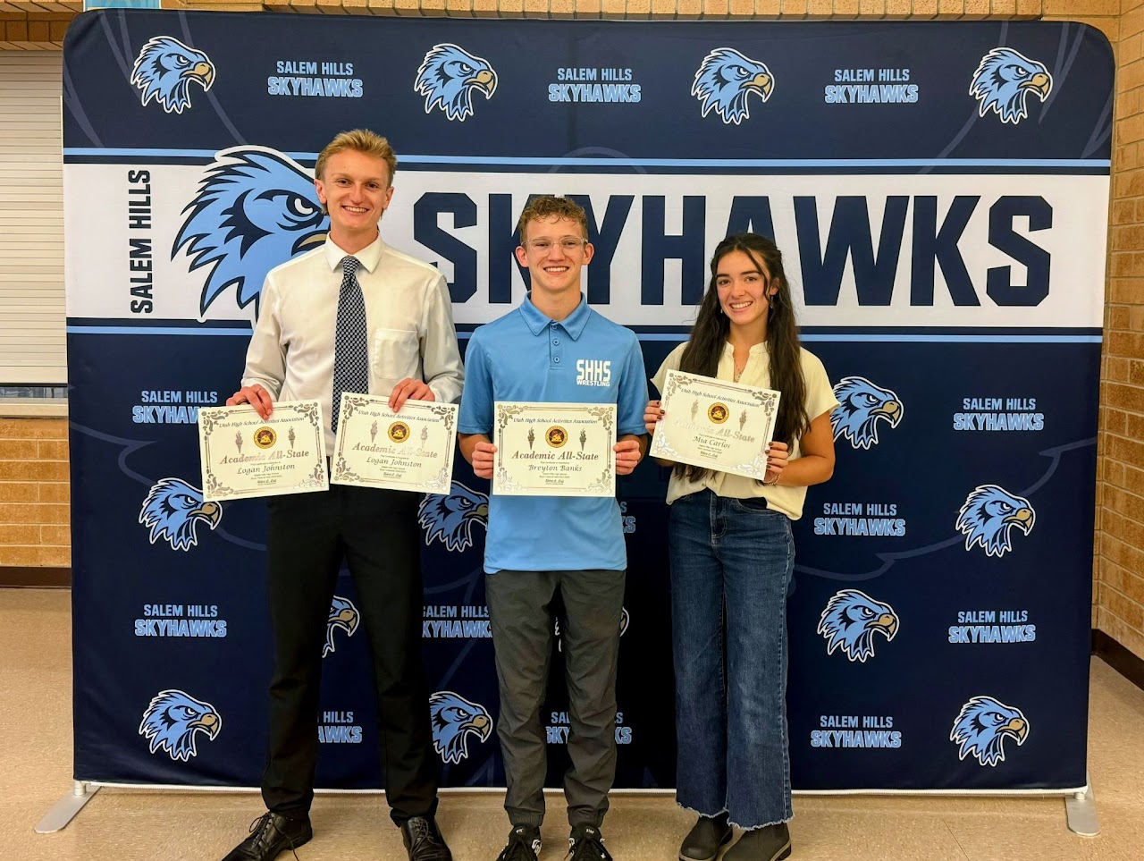 coaches and students getting their award