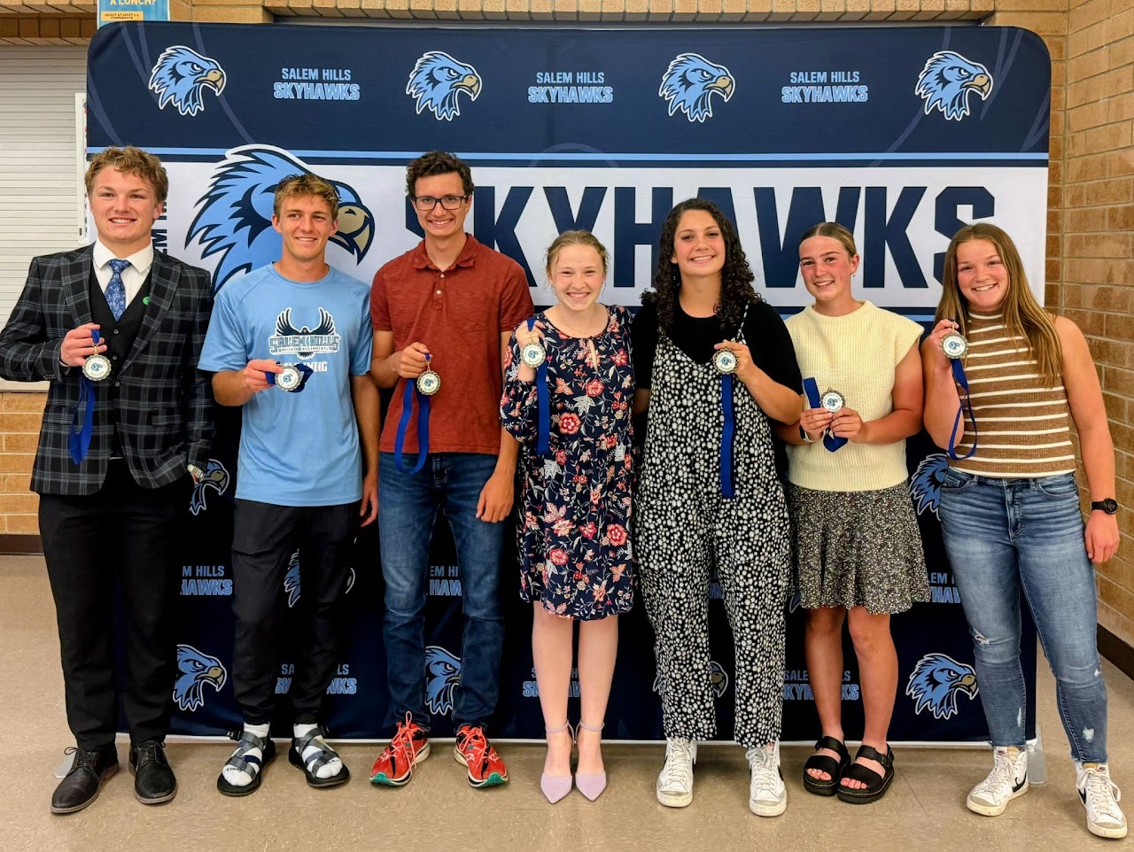 coaches and students getting their award