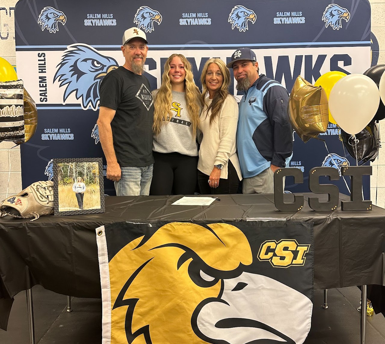 parents and student smiling