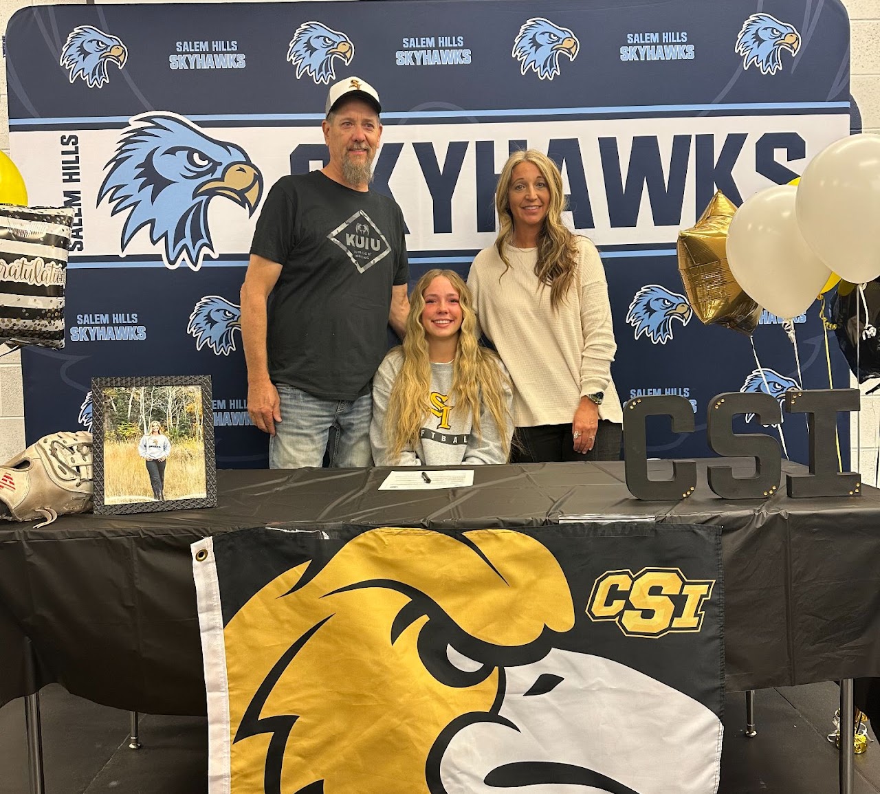 parents and student smiling