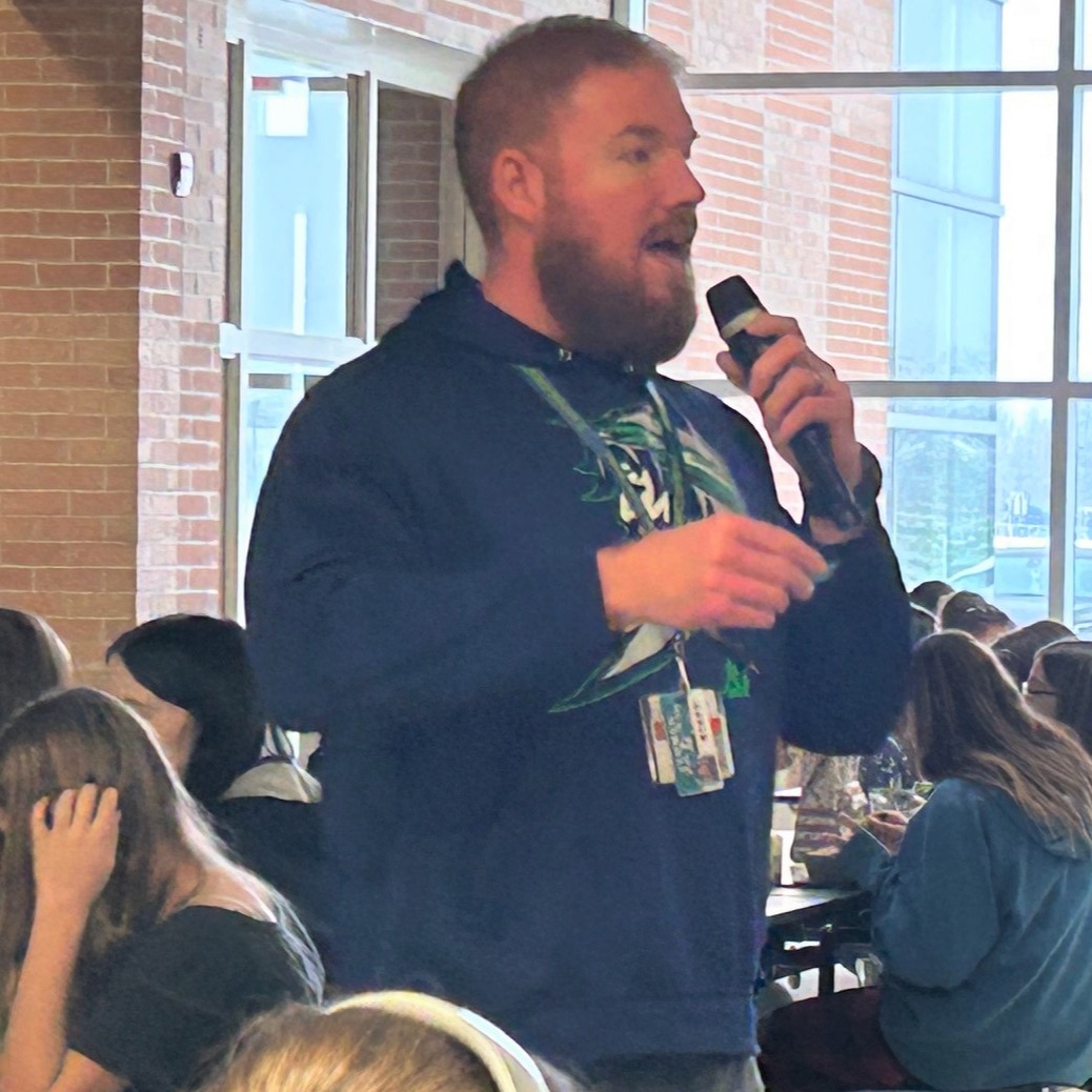 Rich Cross speaks on the microphone during a recent Lightning Fun Lunch at Zemmer.