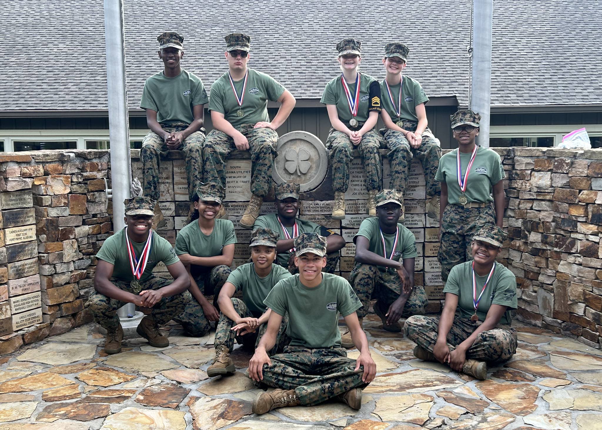 Picture of MCJROTC students at summer leadership camp. 