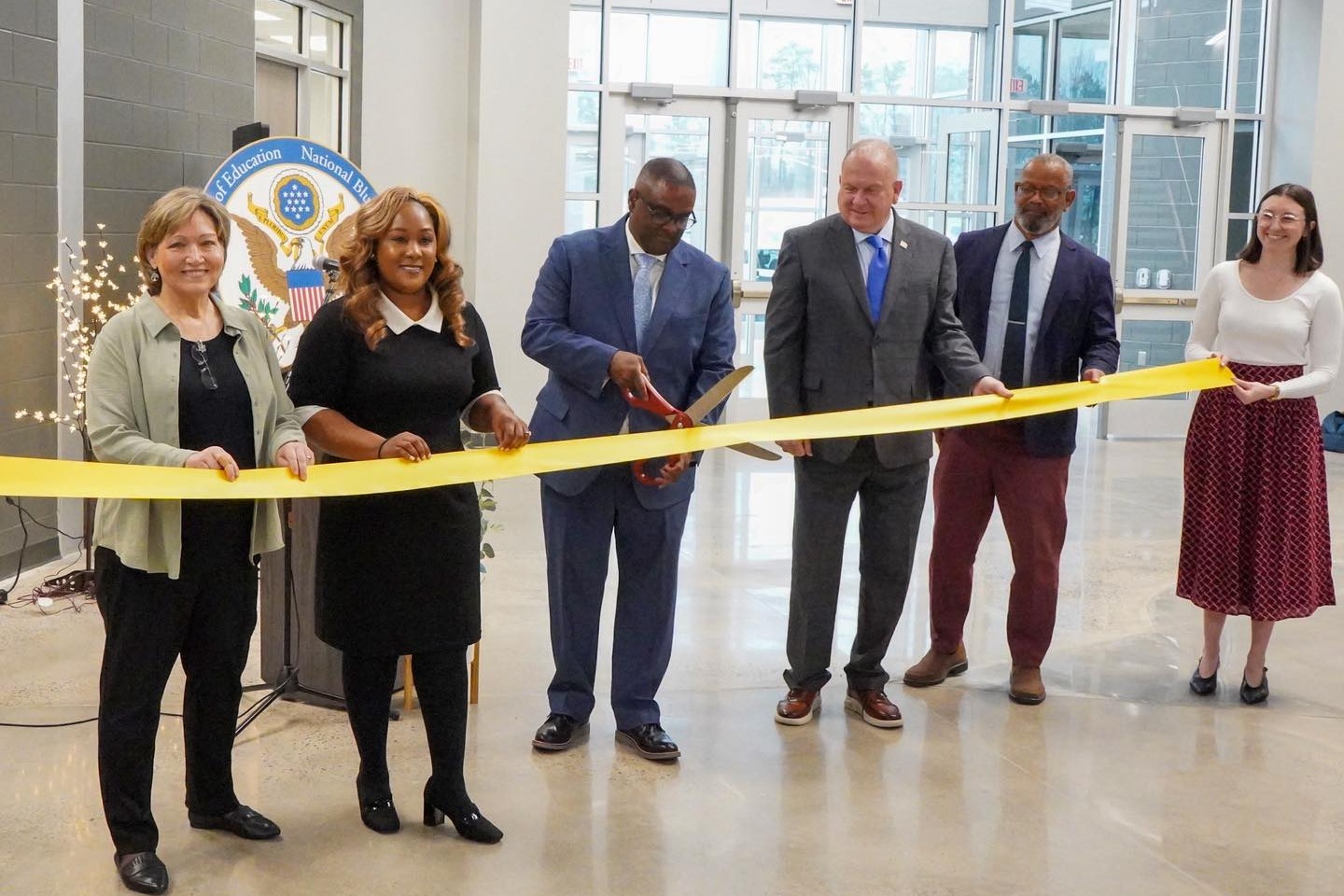 JCIB Ribbon cutting on their new campus.
