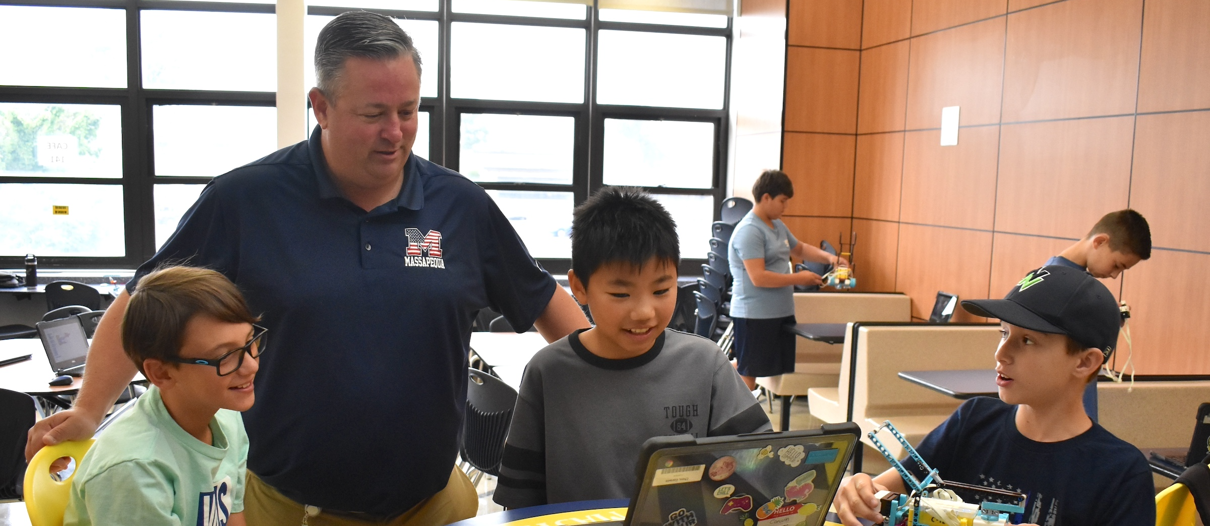 Dr. Brennan with Robotics Campers