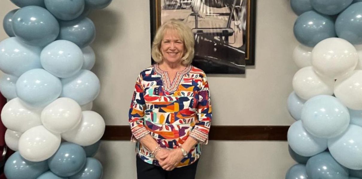 Superintendent Theresa Axford and balloons