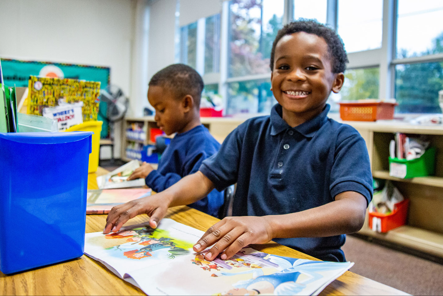 Students engaged in classroom instruction and collaborative academic learning.