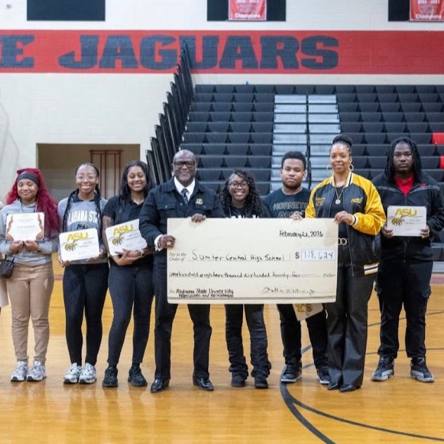 Students being awarded scholarships