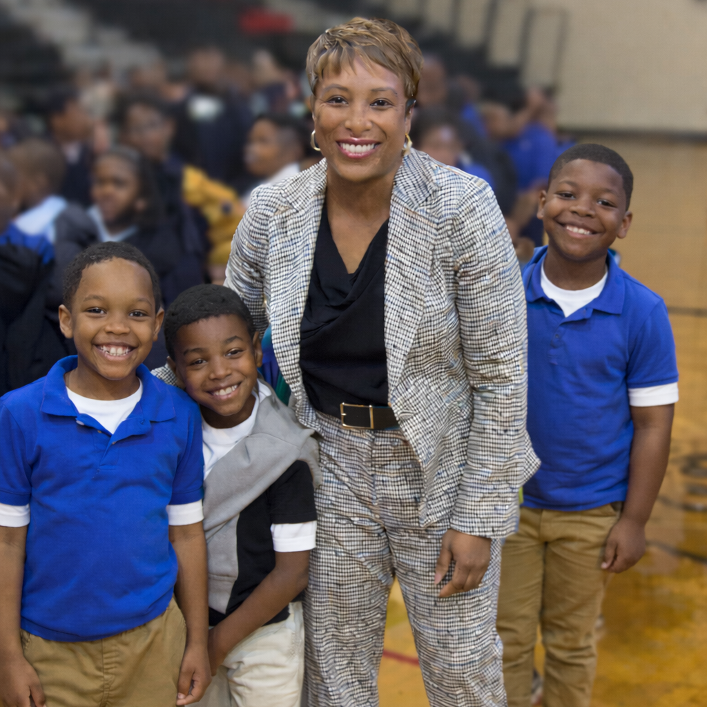 Superintendent in the gymnasium with students