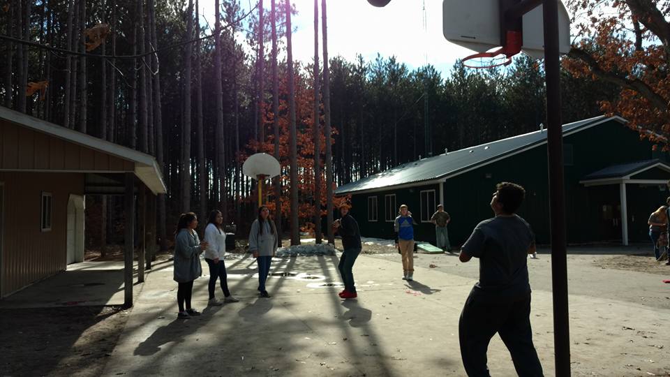 A photo of the students playing volleyball.