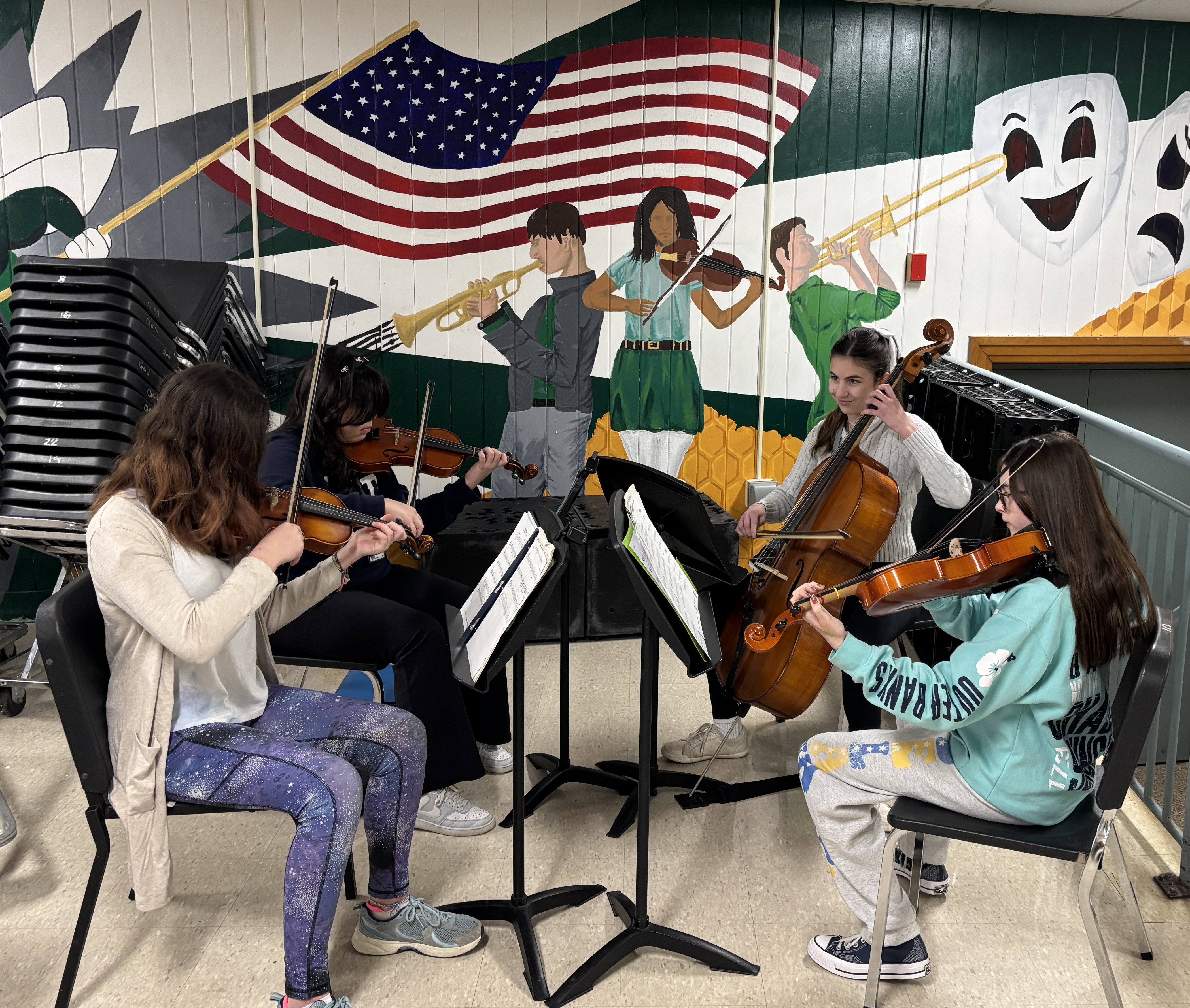 QMS Orchestra students practice for their upcoming concert!