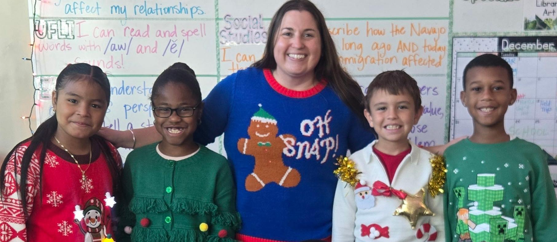 group wearing ugly sweaters for spirit week