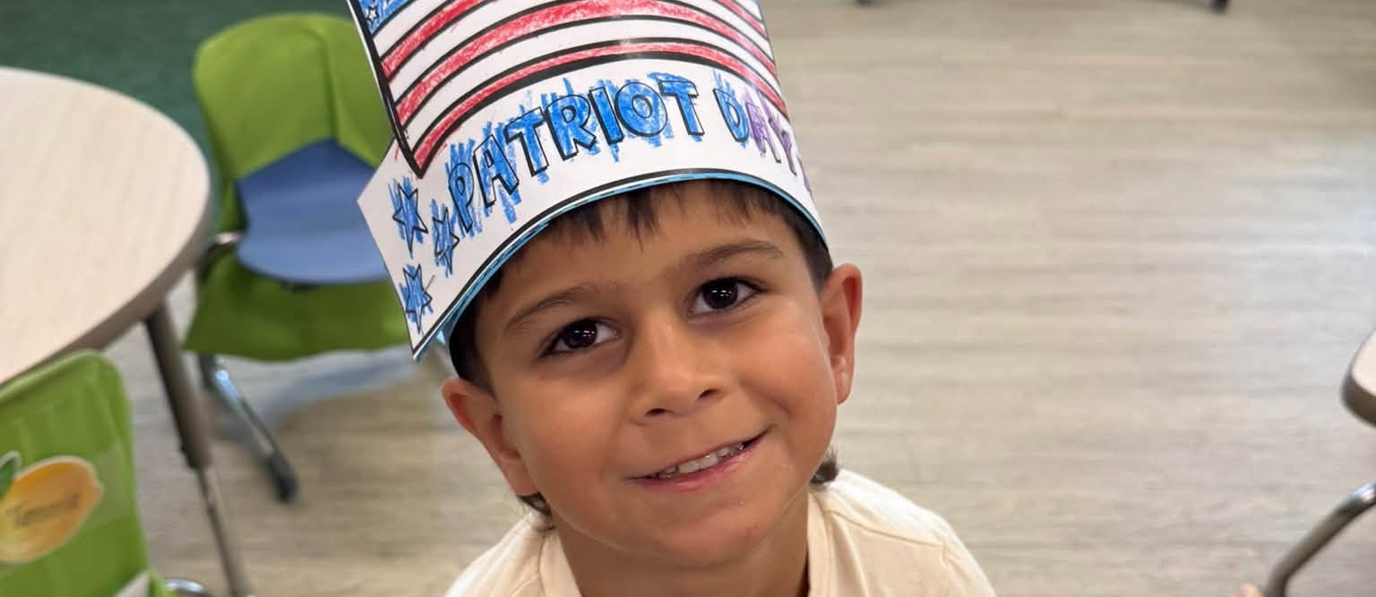 Patriots Day boy with had