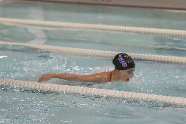 student swimming