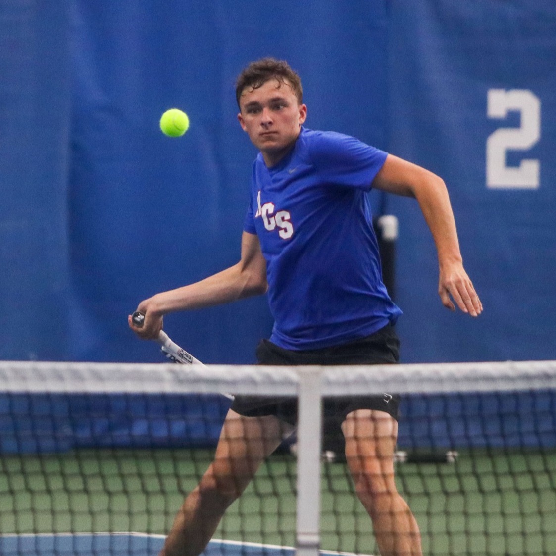 students playing tennis