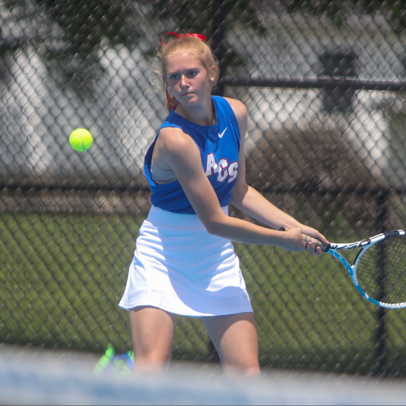 students playing tennis