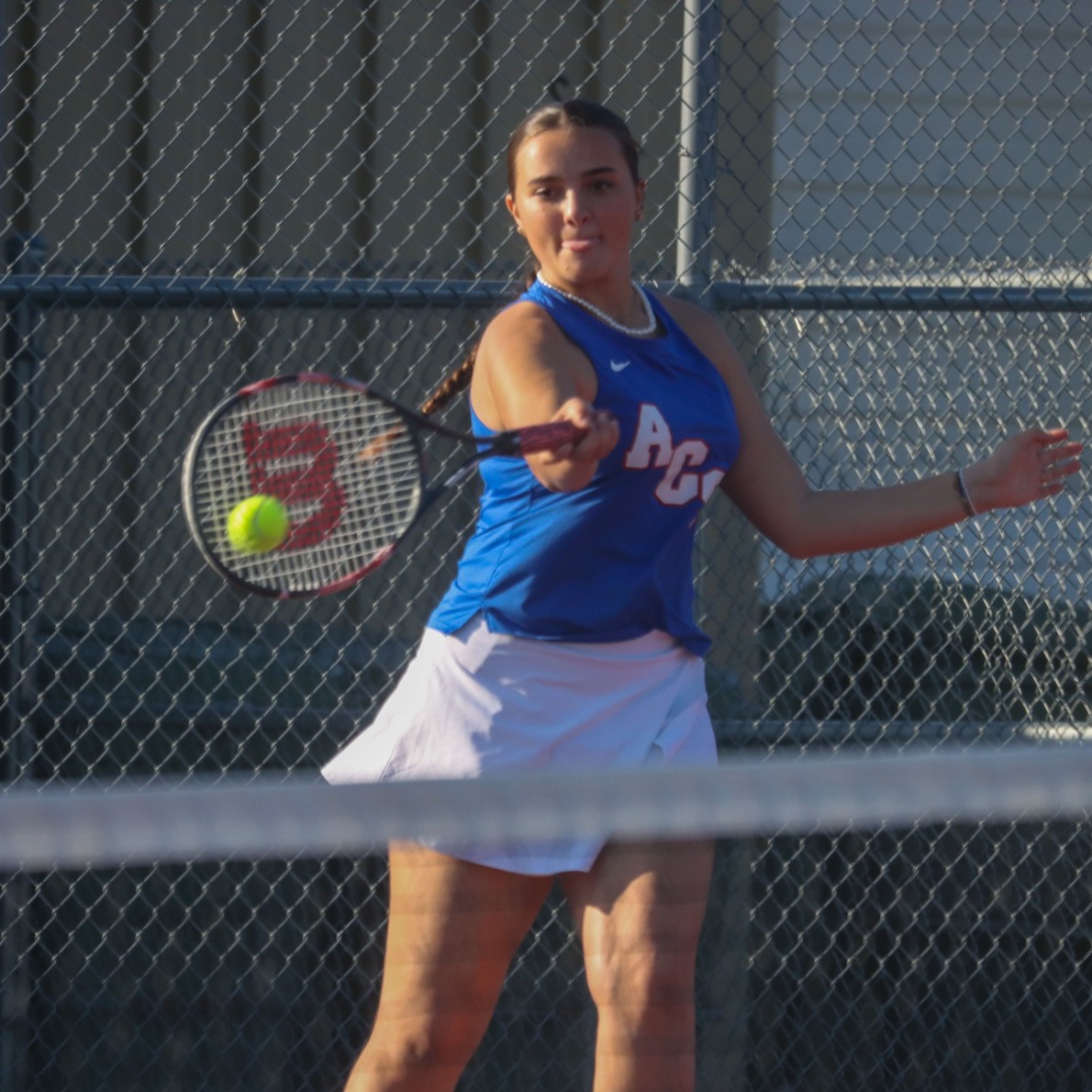 students playing tennis