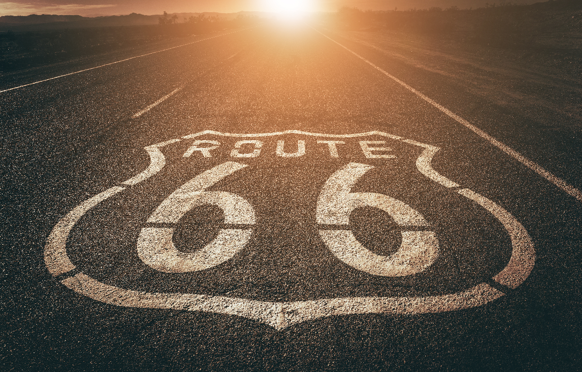 A Route 66 sign is displayed along the road