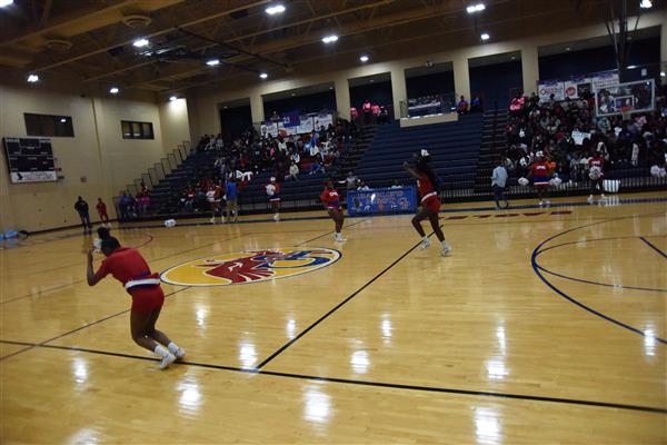 Two basketball players on court.