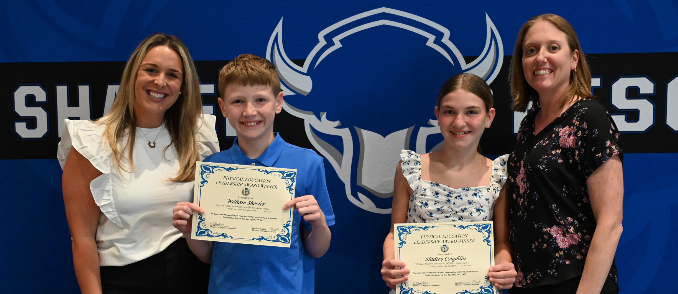 Blue Creek Students Holding Certificates for Phys Ed. Awards