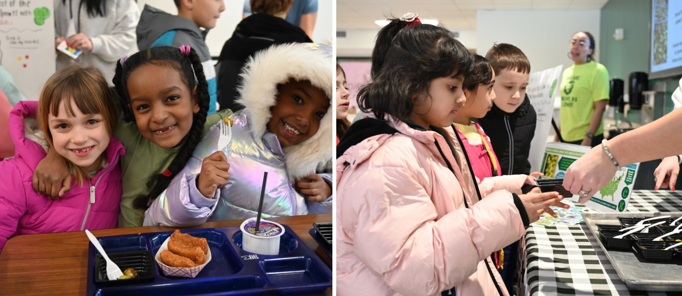 Three students smiling and one student receiving something