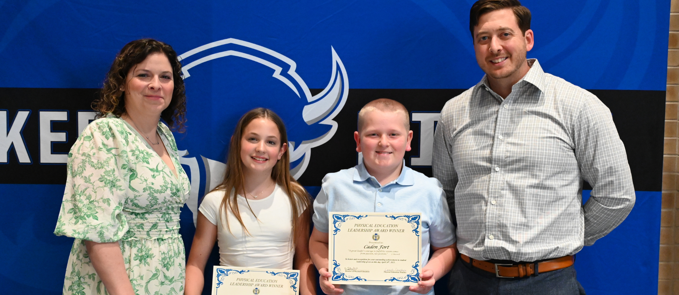 Latham Ridge Students Holding Certificates for Phys Ed. Awards