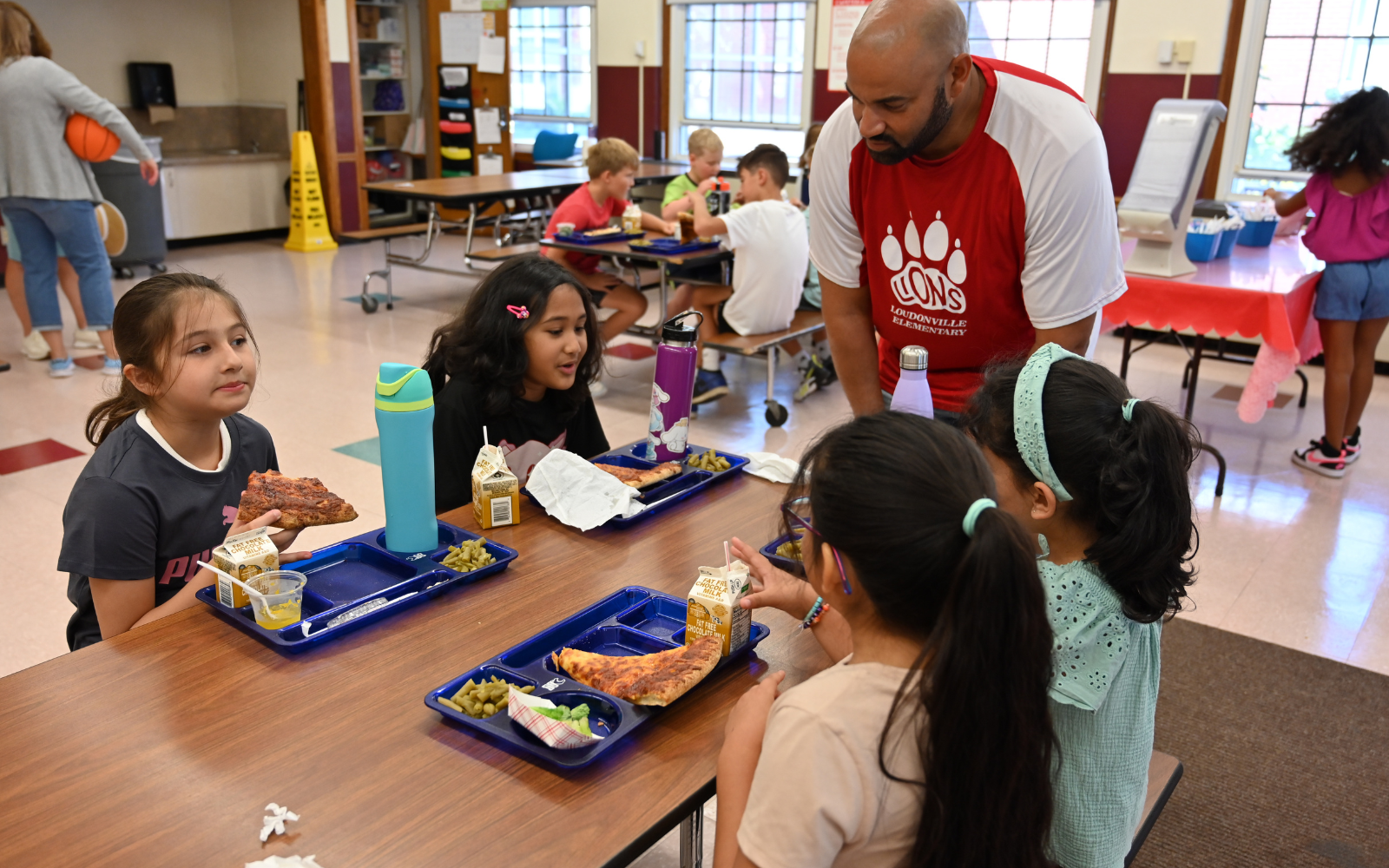 teacher teaching to his students