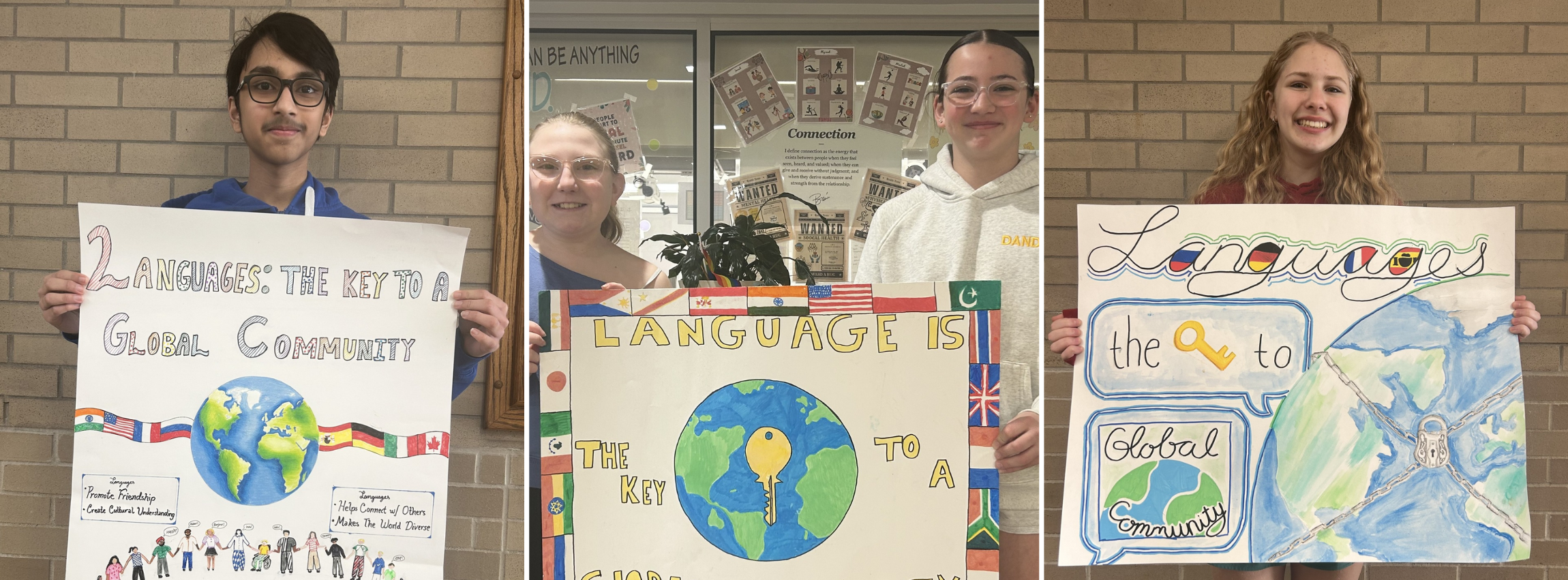 Shaker middle school students holding up posters to celebrate world language month
