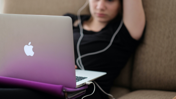 Student looking at laptop