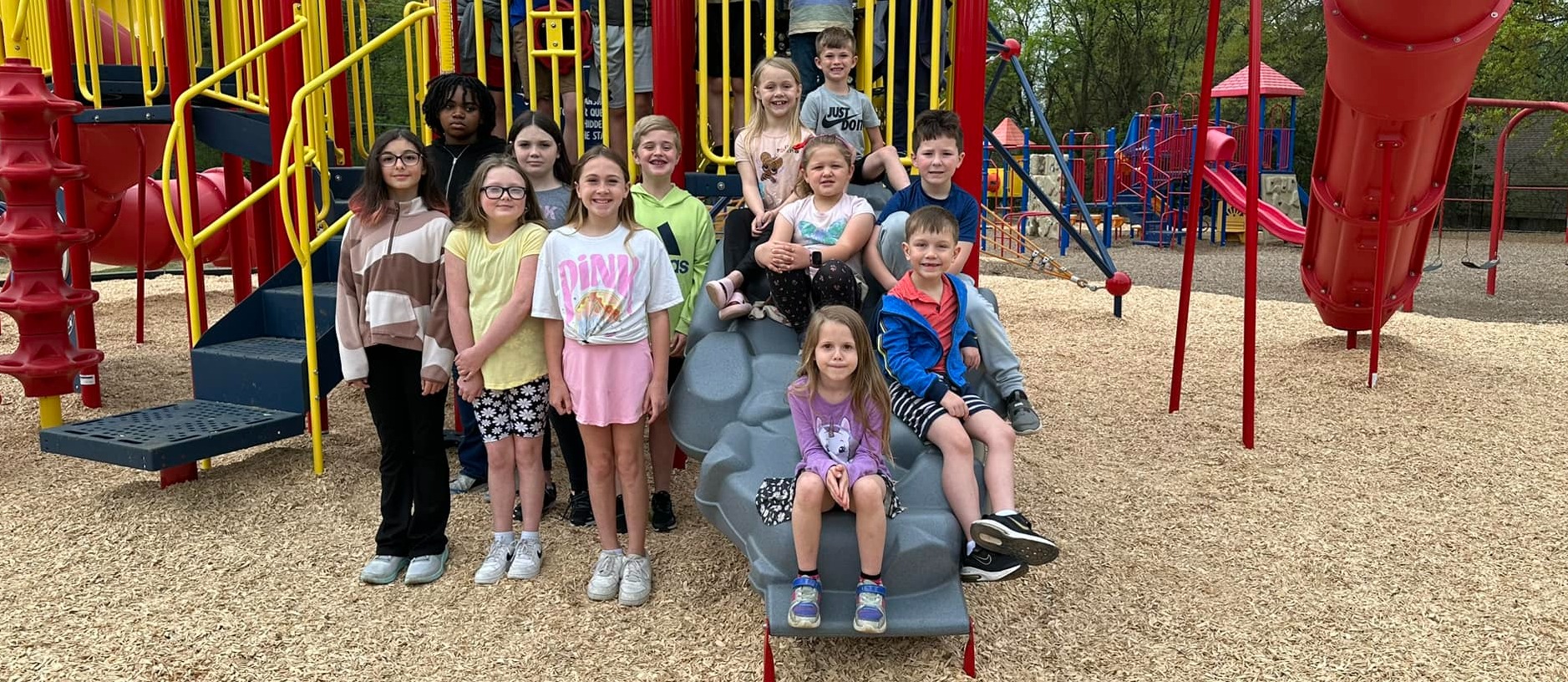 Snow Rogers students are trying out their new playground equipment. 