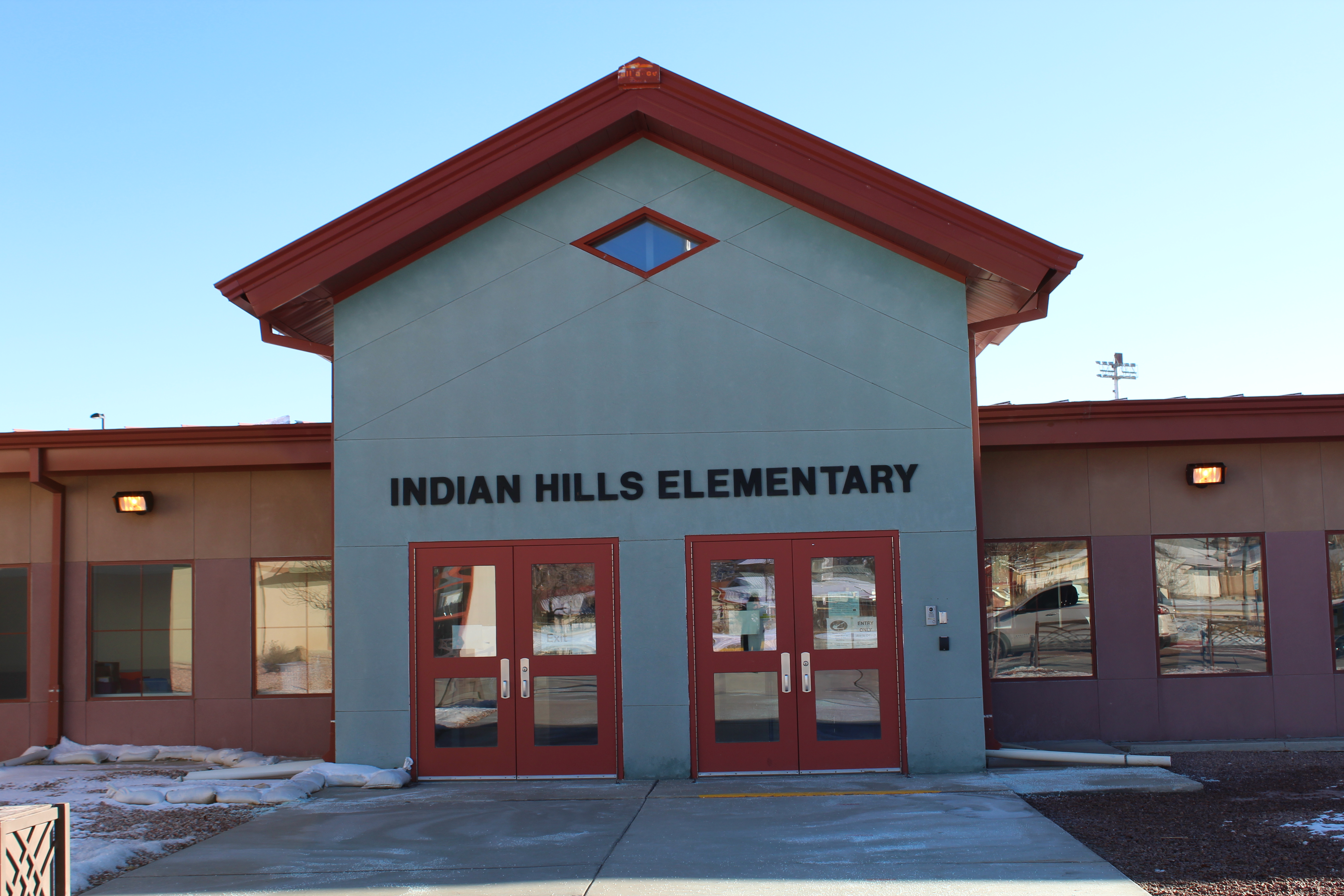 The red and white facade of Indian Hills Elementary.