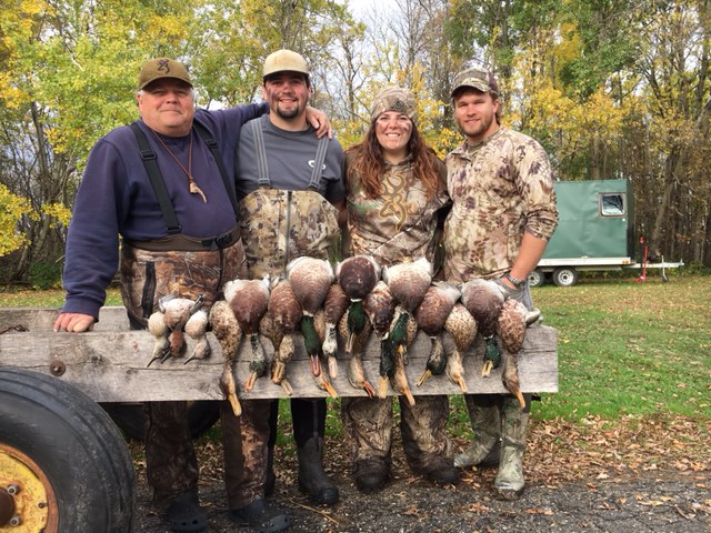 A photo of Mr. Aeling and his family duck hunting